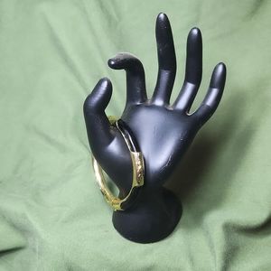 Womens black and gold clasp bracelet